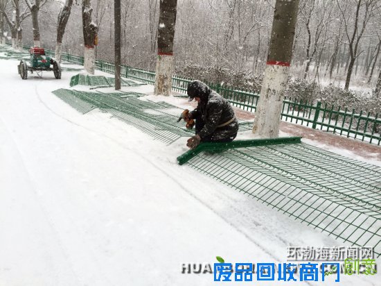 唐山世园会建设者冒雪奋战＿本网独家＿唐山环渤海新闻网