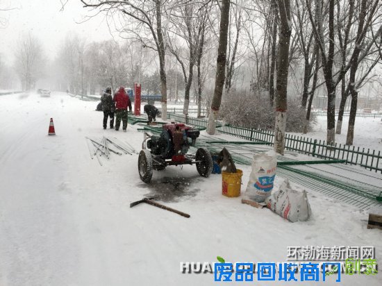 唐山世园会建设者冒雪奋战＿本网独家＿唐山环渤海新闻网