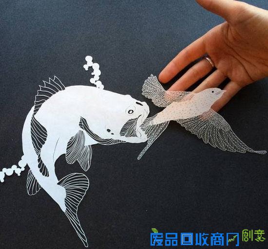 剪纸艺术家白纸上的奇思妙想