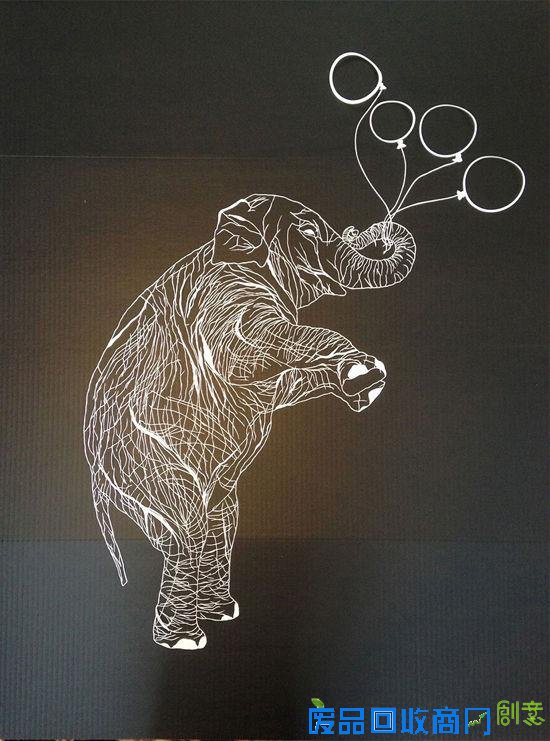 剪纸艺术家白纸上的奇思妙想