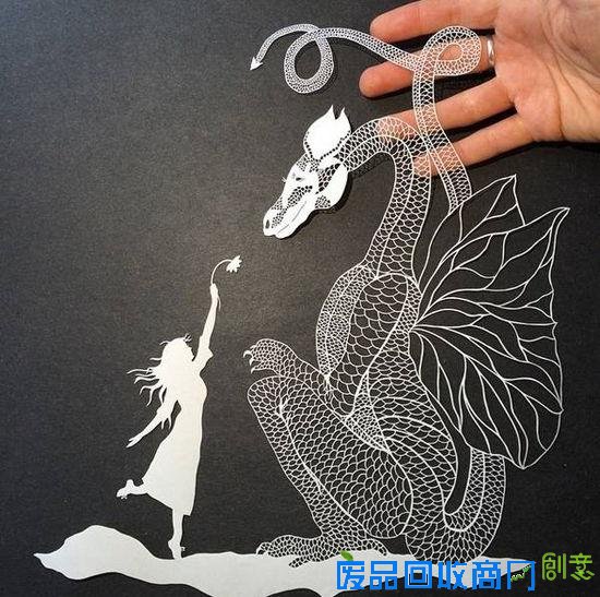 剪纸艺术家白纸上的奇思妙想