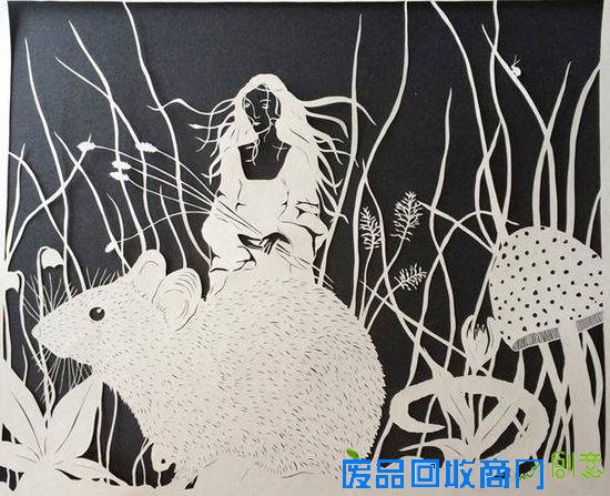 剪纸艺术家白纸上的奇思妙想