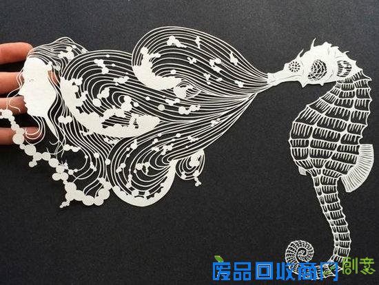 剪纸艺术家白纸上的奇思妙想