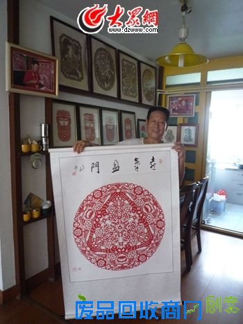 青岛七旬老汉巧手剪出百幅“世园花”