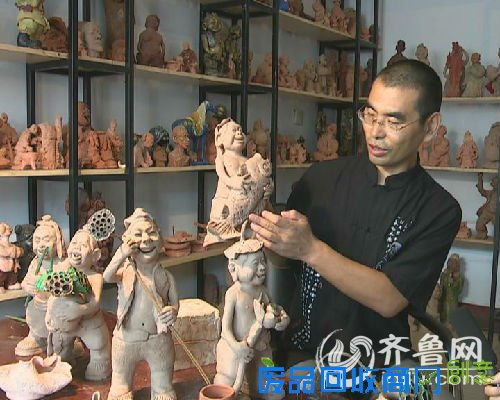 泥塑荷娃喜迎第十一届中国（滕州）微山湖湿地红荷节