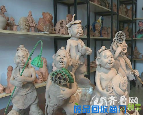 泥塑荷娃喜迎第十一届中国（滕州）微山湖湿地红荷节