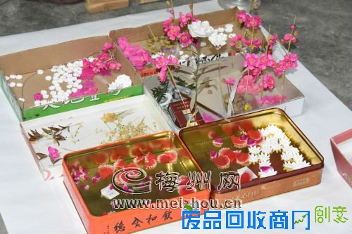 埔寨纸花的用料相当考究,花朵、叶子一定要用台湾优质通草纸,花枝、树干一定要用纸藤、绢布、铜丝。