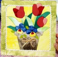 和小朋友一起做秋天的布贴画