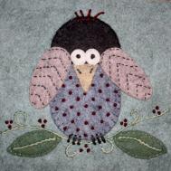 和小朋友一起做秋天的布贴画