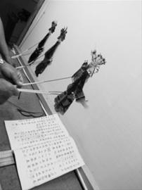 沈阳：九位传承人进校园上非遗课（图）