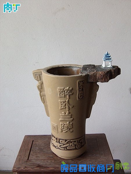 废旧酒瓶子还能做什么用？将废旧酒瓶改造成花盆的步骤图解╭★肉丁园艺网