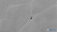 美探测器拍摄到冥王星表面出现“神秘蜗牛”爬行