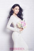 美女日历：张馨予梦幻婚纱照 头盖薄纱端庄贤淑