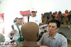 《中国新闻人网》泥塑大师――胡新明