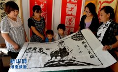 河南夏邑：创意剪纸献礼抗战胜利70周年