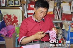 京城百工坊：爱创新的剪纸大师(图)