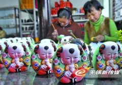 无锡：贺岁版“阿福阿喜”泥塑问世 萌翻市民（图）