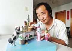 苏州泥人彩绘再现“宠猪举灶”