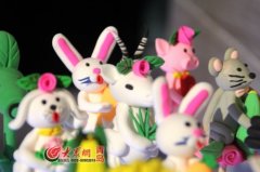 青岛恢复腊月集市 耍皮影捏面塑唤醒浓浓年味