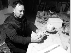 周国防：“湖南泥人周”