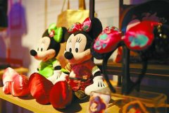 迪士尼商品烙上中国风 上海乐园将首次推出梦想护照