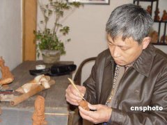 河南“泥人赵”用黄河泥捏出多彩生活(组图)