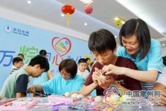 万粽同心为公益 港华轻风义工走进光华学校