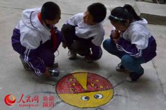 井盖也卖萌乌鲁木齐幸福路社区涂鸦井盖（图）